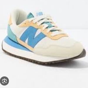 New Balance Women's 237 sneakers. This specific colorway is "KhakiOcean 8.5